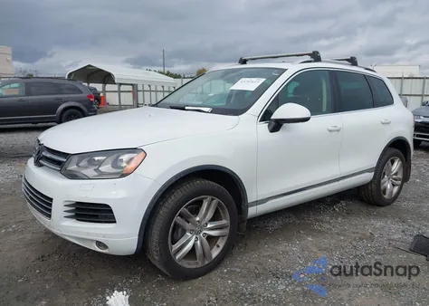 2014 Volkswagen Touareg Tdi Executive z USA, uszkodzony, nr VIN WVGEP9BP3ED009352
